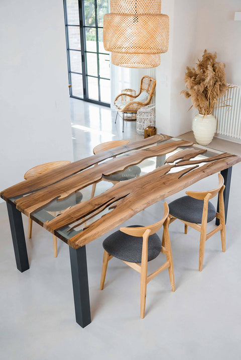 Custom epoxy sining table in clear resin and walnut wood Romea