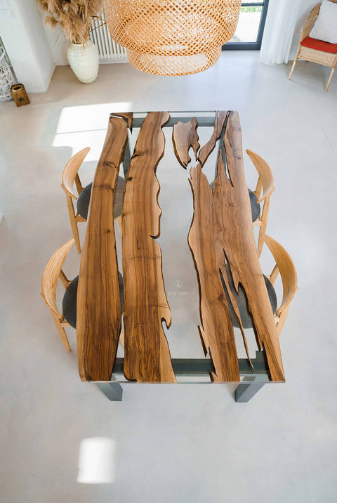 Custom epoxy sining table in clear resin and walnut wood Romea