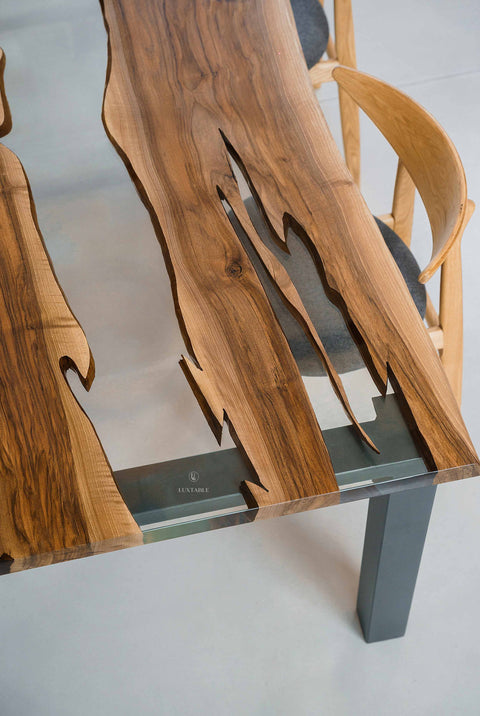Custom epoxy sining table in clear resin and walnut wood Romea