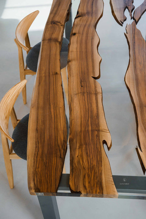 Custom epoxy sining table in clear resin and walnut wood Romea