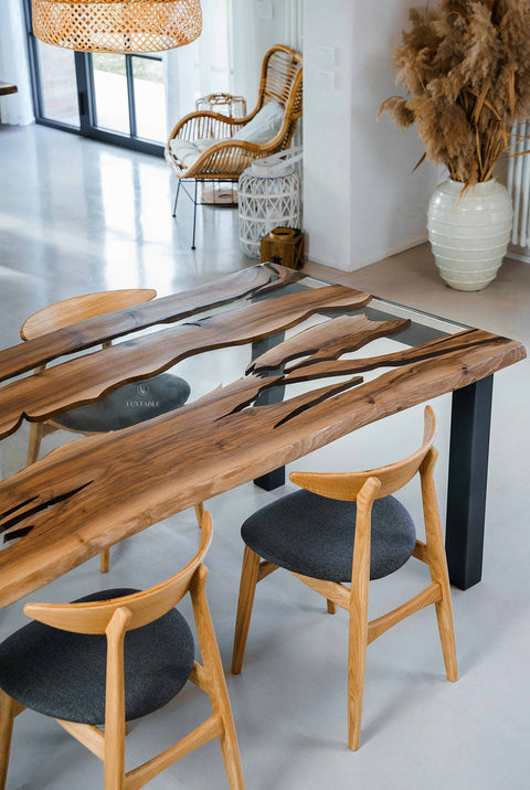 Custom epoxy sining table in clear resin and walnut wood Romea