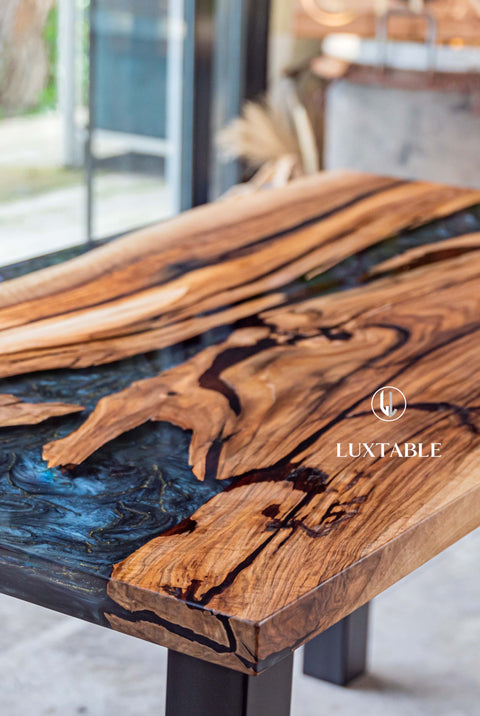 Walnut wood table with blu and gold resin, various sizes Maleficenta
