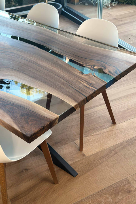 Clear and blue epoxy river table in walnut wood, custom size Armonia