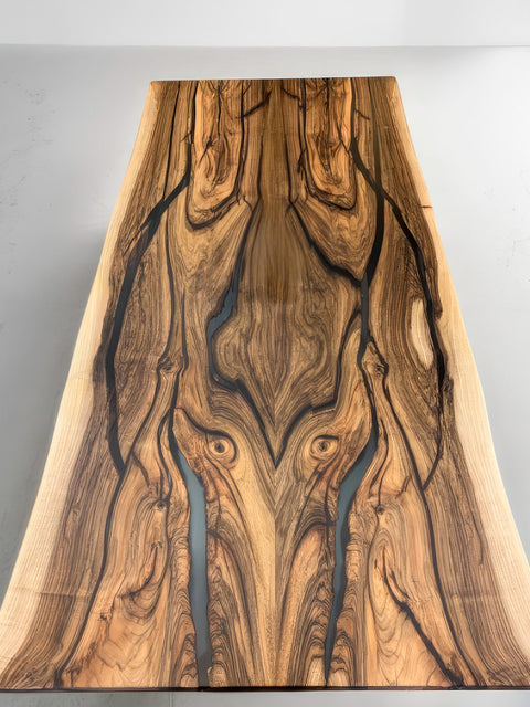 Dining table of solid walnut with grey epoxy resin Maestoso