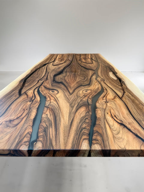 Dining table of solid walnut with grey epoxy resin Maestoso