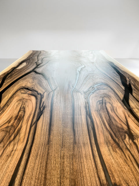Dining table of solid walnut with grey epoxy resin Maestoso
