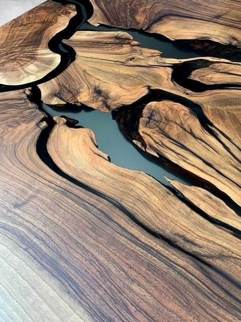 Solid wood table in walnut with smoke matte epoxy Resonance
