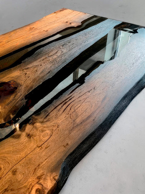 Ancient bog oak table with transparent glossy epoxy resin Echo