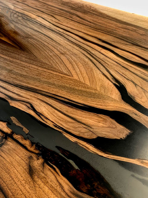 Solid wood table in walnut with smoke matte epoxy Resonance